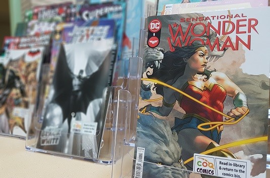 comic issues displayed on a counter