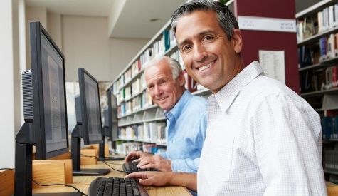 two-men-using-library-computers