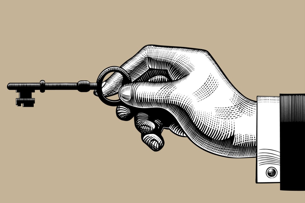 illustrated hand holding skeleton key